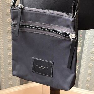 Sleek Minimalist Marc Jacobs Black Crossbody Bag with Silver Hardware